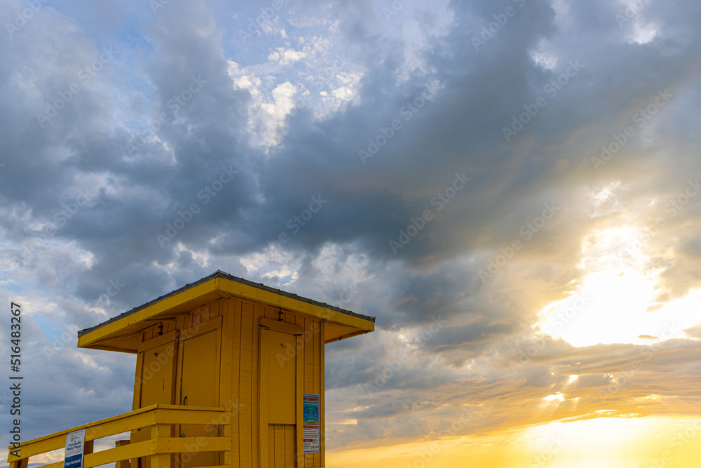 Storm Breaking Over Lifeguard Stand at Sunset on Siesta Key Beach, Siesta Key, Florida, USA Storm Breaking Over Lifeguard Stand at Sunset on Siesta Key Beach, Siesta Key, Florida, USA
