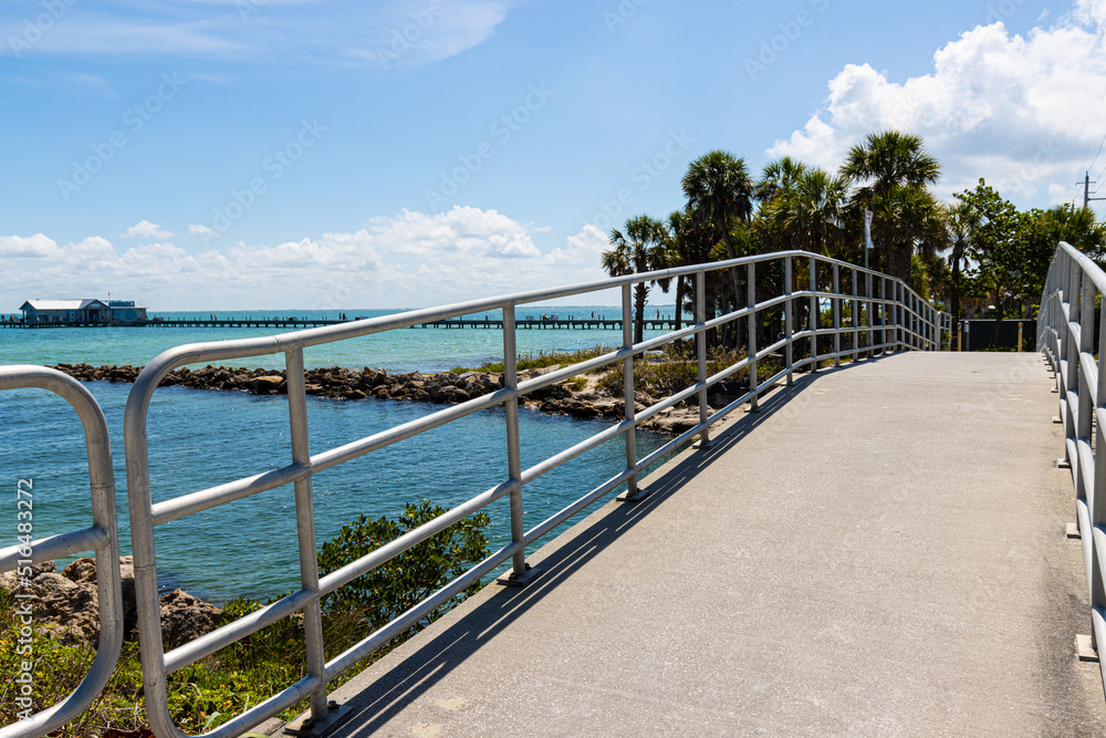 Small Bridge Over a Canal  With Amelia Island Pier in The Distance, Amelia Island, Florida, USA