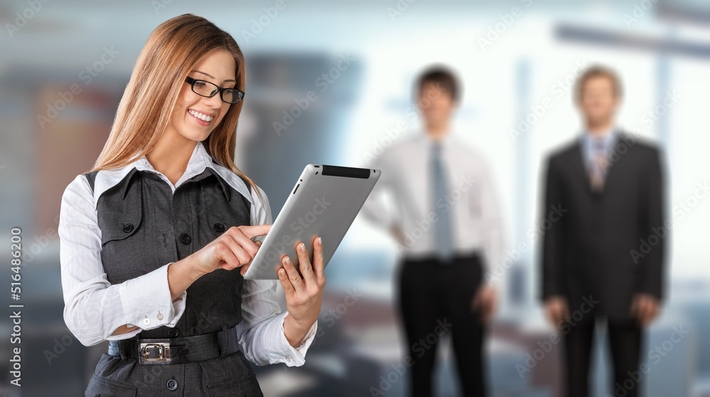 Confident stylish european business woman standing at workplace. Confident stylish european business woman standing at workplace.