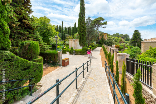 A sunny summer afternoon in the scenic Jardins Rei Joan Carles, a public garden in the historic picturesque village of Valldemossa on the Balearic island of Palma, Spain. photo