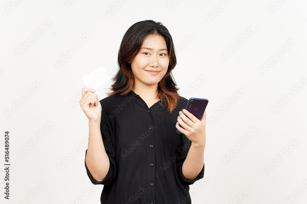 Holding smartphone and blank credit bank card of Beautiful Asian Woman Isolated On White Background Holding smartphone and blank credit bank card of Beautiful Asian Woman Isolated On White Background