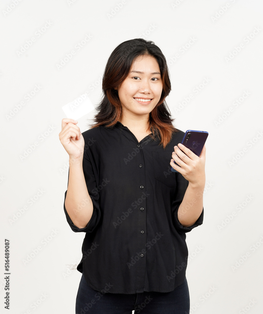 Holding smartphone and blank credit bank card of Beautiful Asian Woman Isolated On White Background Holding smartphone and blank credit bank card of Beautiful Asian Woman Isolated On White Background