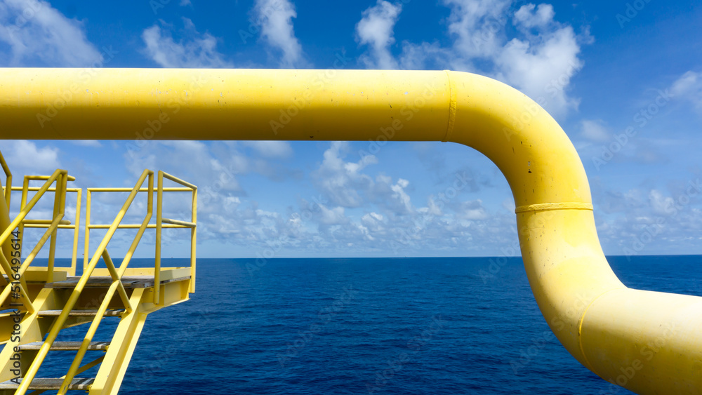 Oil and gas processing plant with pipe line valves.Steel pipelines and valves.Oil pipeline valves in the oil and gas industry. Oil and gas processing plant with pipe line valves.Steel pipelines and valves.Oil pipeline valves in the oil and gas industry.