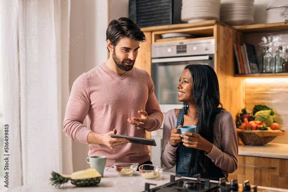 © santypan - Multi-Ethnic Couple at Home © santypan - Multi-Ethnic Couple at Home