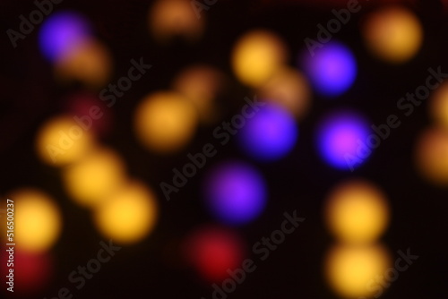 Blurred colorful lights on black background © TANIDA