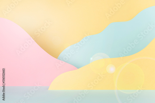 Fantasy cartoon landscape - abstract scene mockup with paper mountains in pink, yellow, mint color, sun beam glare. Template for advertising, design, card, presentation of cosmetic, goods, poster.