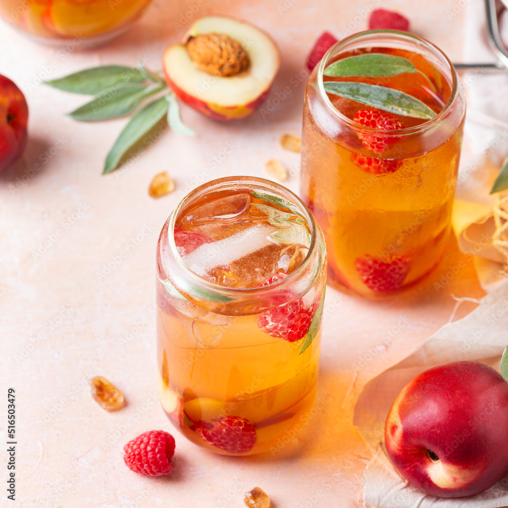 Peach raspberry iced tea, summer refreshing drink, beverage, cocktail Peach raspberry iced tea, summer refreshing drink, beverage, cocktail