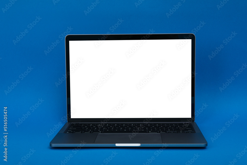 Laptop with blank screen on blue background Laptop with blank screen on blue background