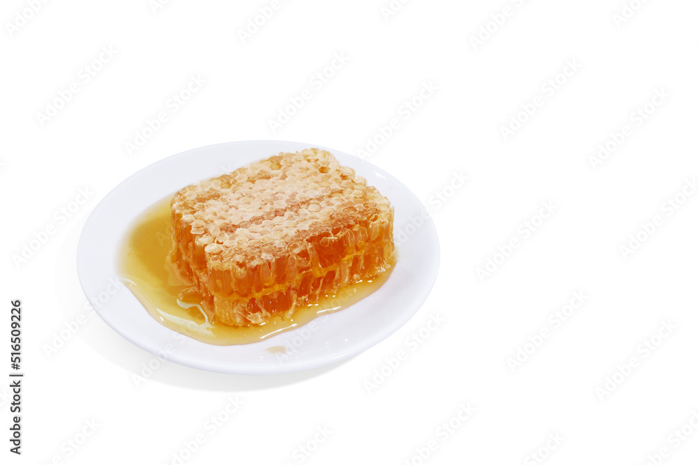 beeswax honeycomb yellow natural honey slices on white plate isolated on white background beeswax honeycomb yellow natural honey slices on white plate isolated on white background