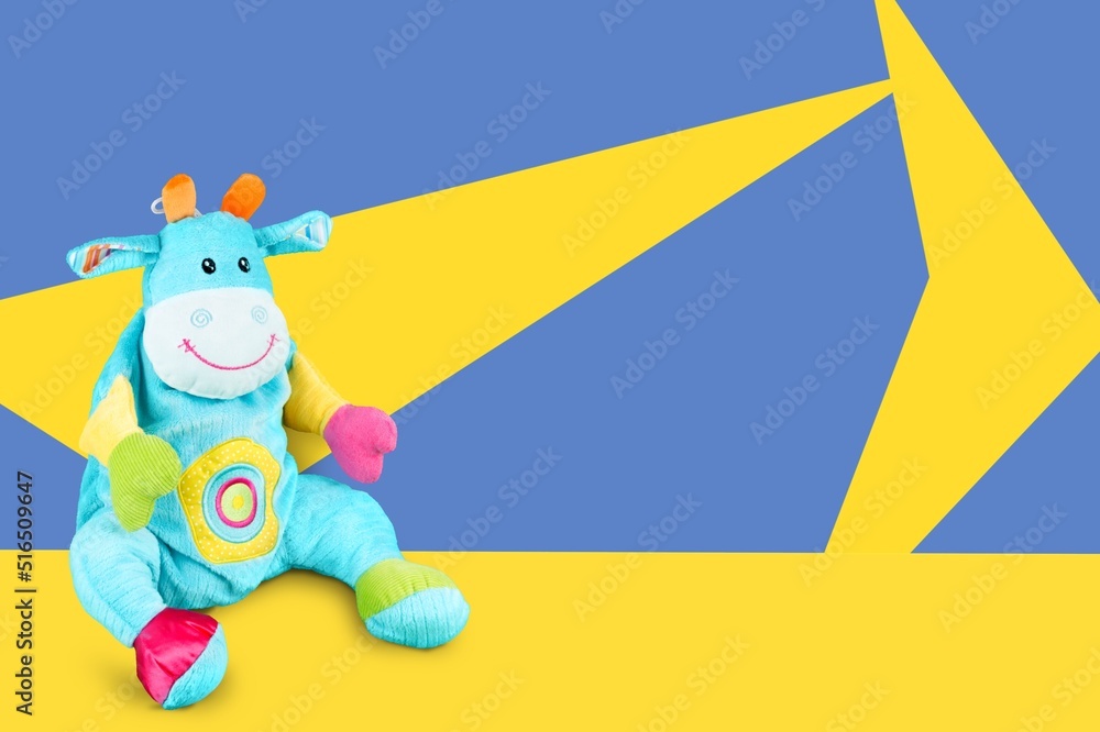 Fototapeta premium World Down Syndrome Day background. Down syndrome awareness symbol. Toy on yellow and blue background.