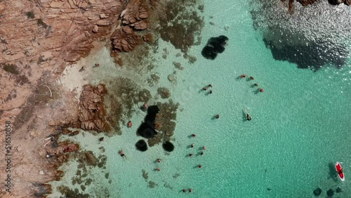 Sardinia - Cala Marras & Cala Giorgio Marino - Flying above beautiful and clear water of the Mediterranean sea photo