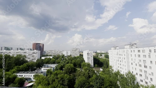 Establishing shot of residential housing apartments in old soviet buildings in Moscow, Russia - Sleeping district in the north of the capital near Babushkinskaya in summer 2022 - Wide shot photo