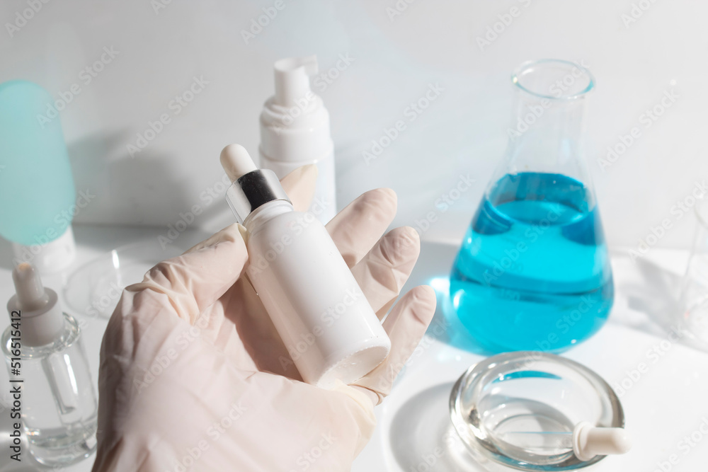 scientist with hand and mockup tube bottle for skin care cosmetic , product branding, cream lotion treatment, laboratory room testing experimental scientist with hand and mockup tube bottle for skin care cosmetic , product branding, cream lotion treatment, laboratory room testing experimental