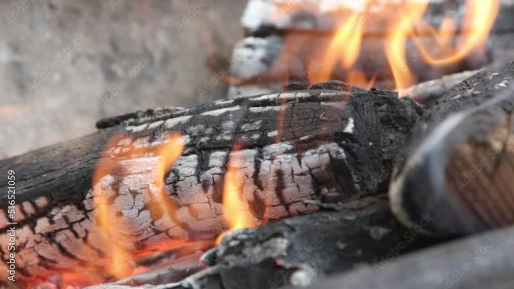 Fried coal briquettes. Scattering of coal: an indirect method. Close-up of a barbecue grill with extinguished coals for a barbecue or barbecue Fried coal briquettes. Scattering of coal: an indirect method. Close-up of a barbecue grill with extinguished coals for a barbecue or barbecue