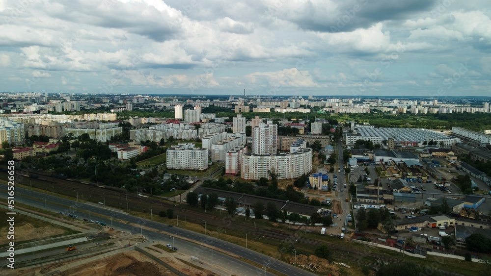 Obraz premium City block. The railway line and motorway pass nearby. Aerial photography.