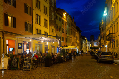 TRENTO, ITALY - SEPTEMBER 1, 2019: Evening view of streets and Piazza Duomo in Trento city, Italy