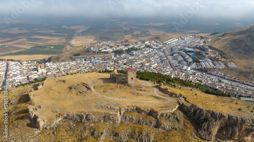 cerro donde se ubica el antiguo castillo nazarí de la Estrella en el municipio de Teba, España photo