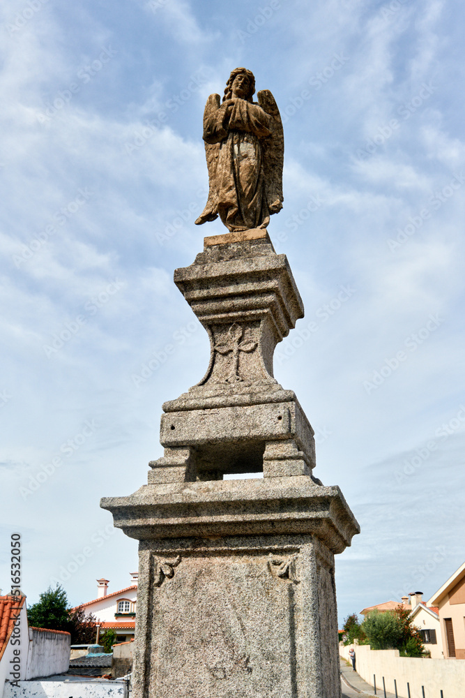 statue in front of the church Santa Marinha in Cortegaca, Ovar district, Portugal
