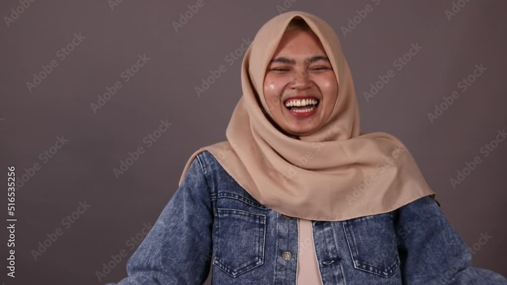 Asian woman pretending dont know anything about problem gesture Asian woman pretending dont know anything about problem gesture