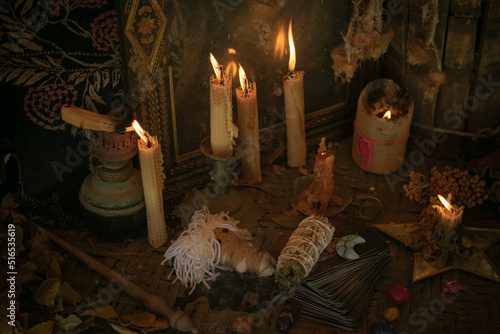 Magic doll for attracting love, rite with voodoo and fate creation, details on a table of witch, occultism concept  photo