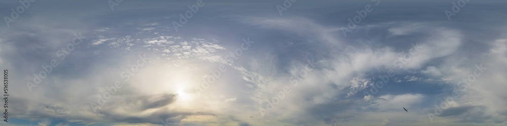 Bright sunset sky panorama with Cirrus clouds. Hdr seamless spherical equirectangular 360 panorama. Sky dome or zenith for 3D visualization, game and sky replacement for aerial drone 360 panoramas.
