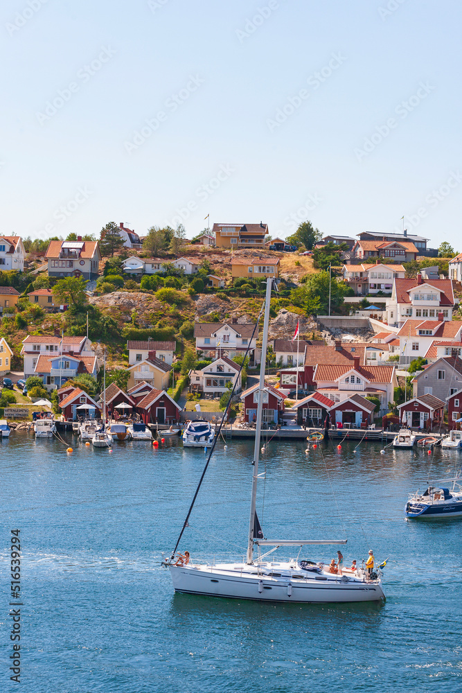 Sailboat at the old coast village Fiskebackskil on the Swedish west coast