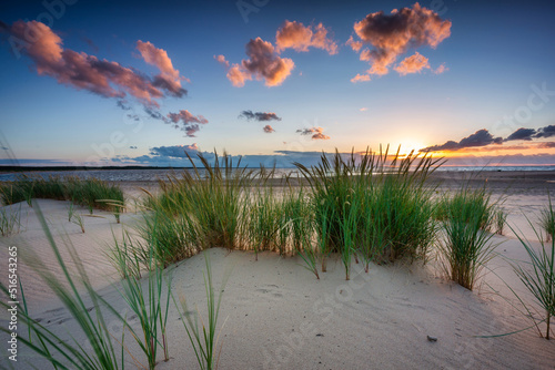Fototapeta Naklejka Na Ścianę i Meble -  Beautiful sunset on the beach of the Sobieszewo Island at the Baltic Sea. Poland