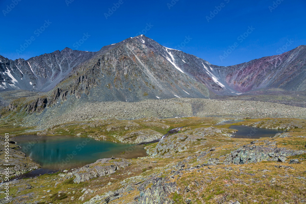 The Valley of the Seven lakes with melting glaciers forming small mountain lakes of different colours, the Altai Republic, Siberia, Russian Federation