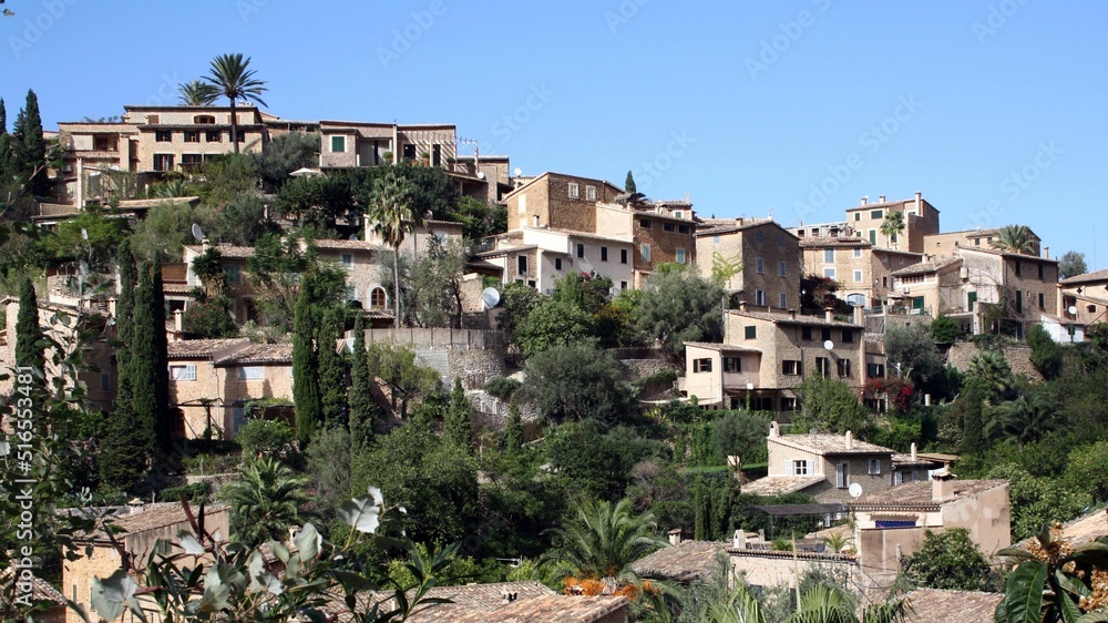 Obraz premium View of Deja in the northwestern Tramuntana mountains on the Balearic island of Majorca, Spain - Blick auf Deja in den nordwestlichen Tramuntana-Bergen auf der Baleareninsel Mallorca