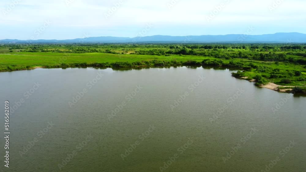 Flying over the lake. Taken by drone. A lake on Bolshoy Ussuriysky Island in the Khabarovsk Territory in Russia. Flying over the lake. Taken by drone. A lake on Bolshoy Ussuriysky Island in the Khabarovsk Territory in Russia.