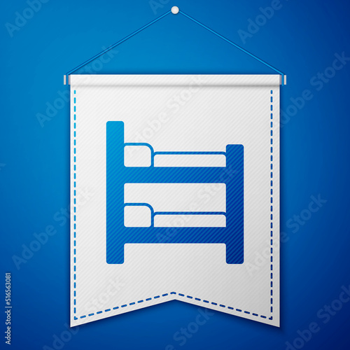 Blue Bunk bed icon isolated on blue background. White pennant template. Vector