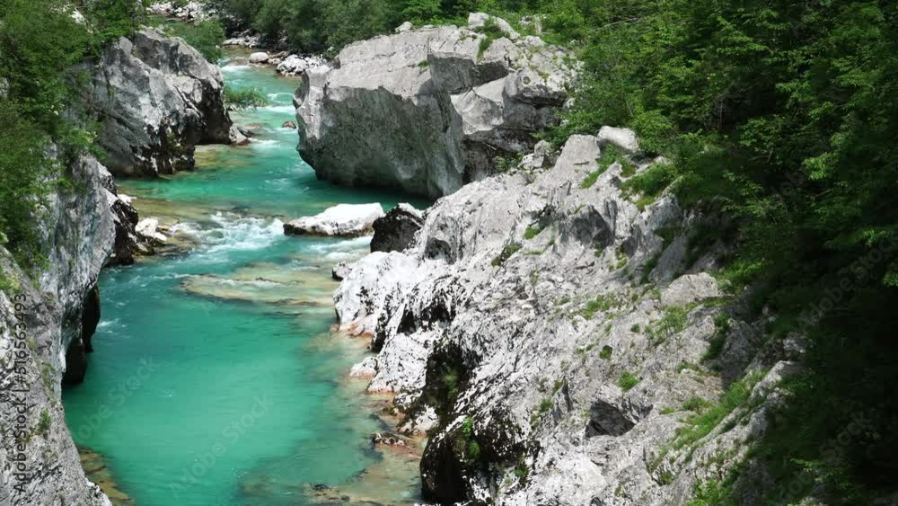 Paddleboarding in the The Great Soča Gorge, Beautiful gorge with emerald coloured water flowing between the uniquely formed rocks, Triglav National Park, Julian Alps, Slovenia, Europe Paddleboarding in the The Great Soča Gorge, Beautiful gorge with emerald coloured water flowing between the uniquely formed rocks, Triglav National Park, Julian Alps, Slovenia, Europe