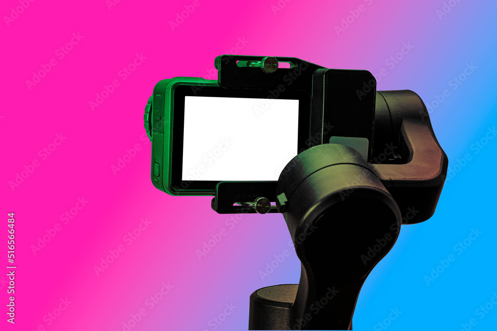 action camera on gimbal stabilizer, isolated on colourful background action camera on gimbal stabilizer, isolated on colourful background
