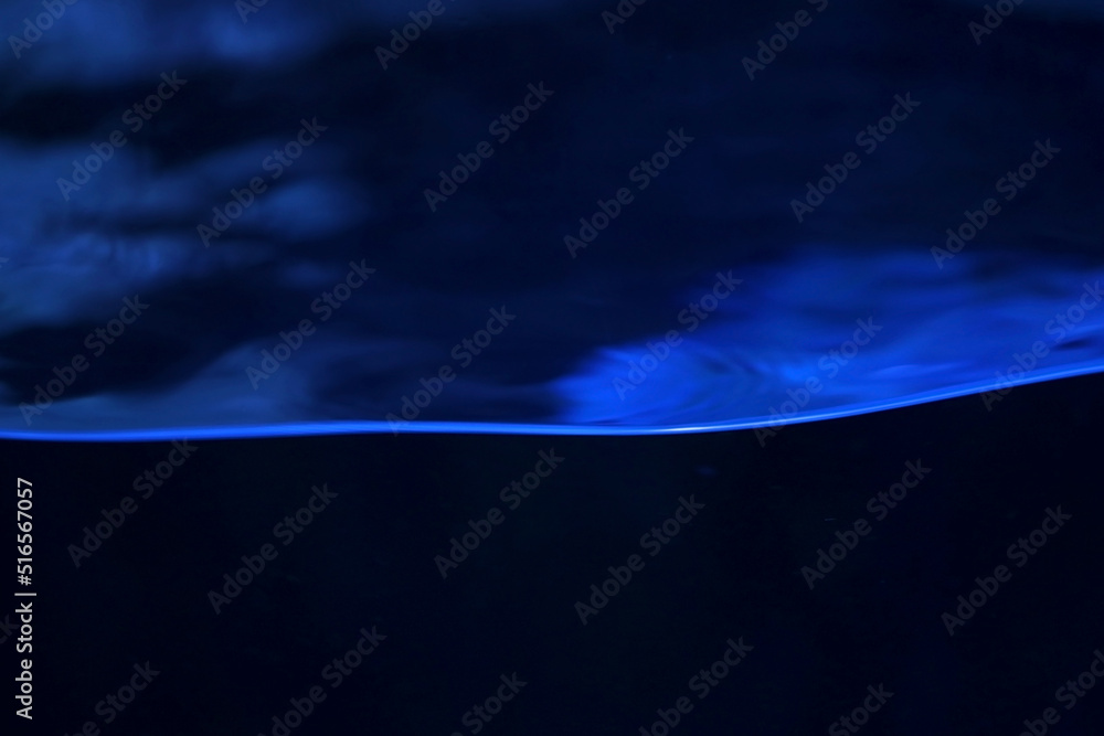 Cross section of water surface, black to azule color image texture 黒い背景 ...