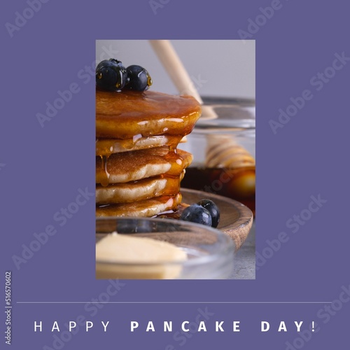 Image of pancakes with berries on plate over purple background