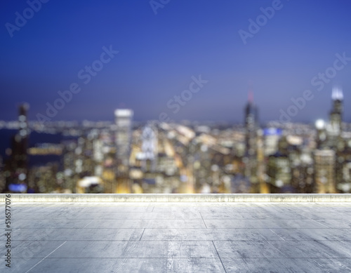 Empty concrete dirty rooftop on the background of a beautiful blurry Chicago city skyline at night  mockup