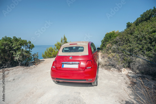 A man has arrived to his holiday destination with his small car 