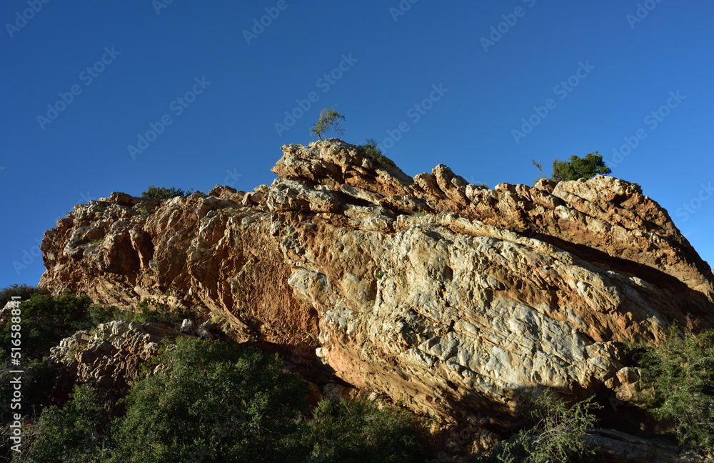 A rugged red sandstone sculpture created by nature in the Karoo South Africa A rugged red sandstone sculpture created by nature in the Karoo South Africa