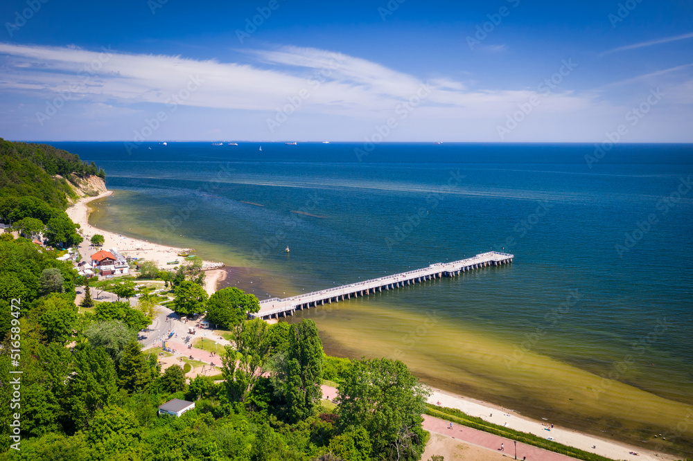 Beach and the pier in Gdynia Orłowo at summer, Poland.