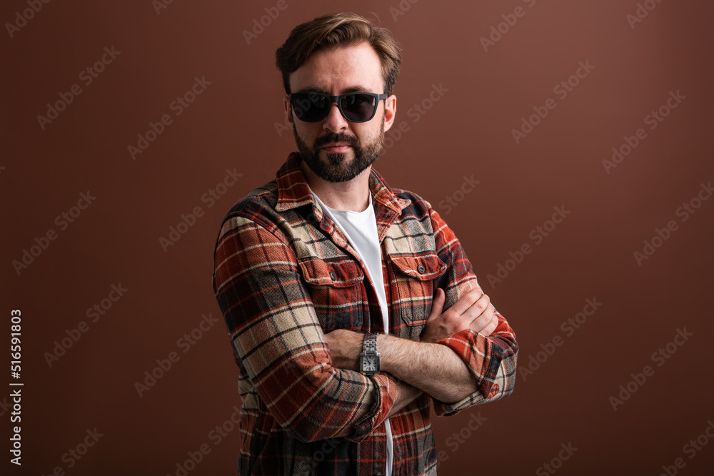 handsome man on brown background handsome man on brown background