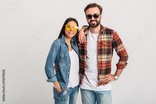 stylish man and woman in casual denim hipster outfit having fun