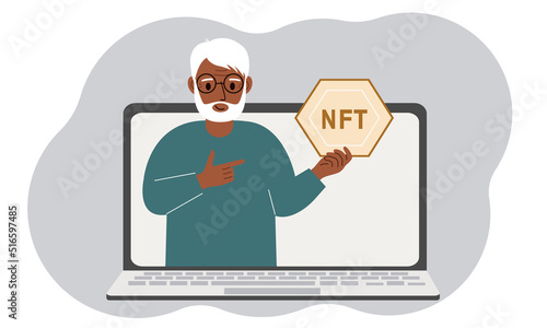 NFT concept. A laptop in which a old man with the image of NFT in the palm of his hand. Auction of non-fungible tokens, markets, online education.