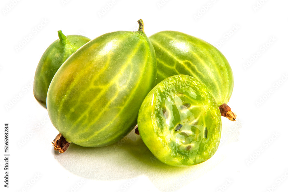 Fresh ripe raw green gooseberry, group of whole and half gooseberries isolated on white background Fresh ripe raw green gooseberry, group of whole and half gooseberries isolated on white background