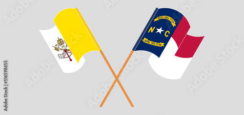 Crossed flags of Vatican and The State of North Carolina. Official colors. Correct proportion