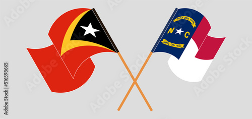 Crossed flags of East Timor and The State of North Carolina. Official colors. Correct proportion photo