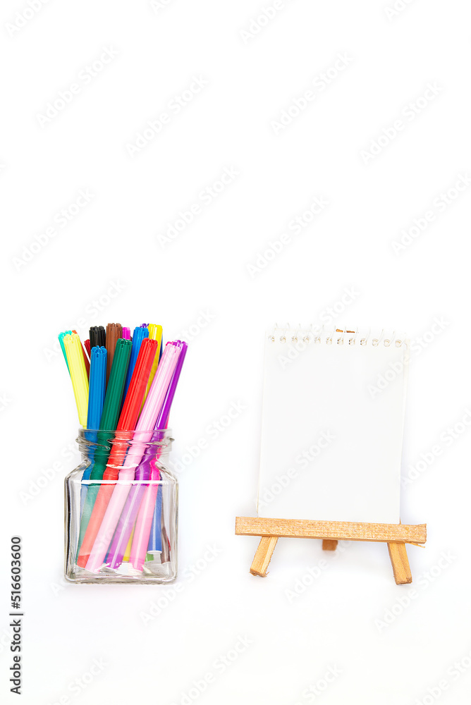 school stationery with markers and other supplies on white background. back to school concept school stationery with markers and other supplies on white background. back to school concept