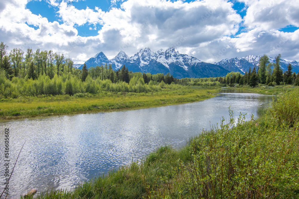river in the mountains at grand tetons