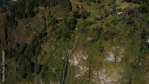 Aerial View Of Cascada de la Virgen Waterfall, Banos Ecuador - drone shot