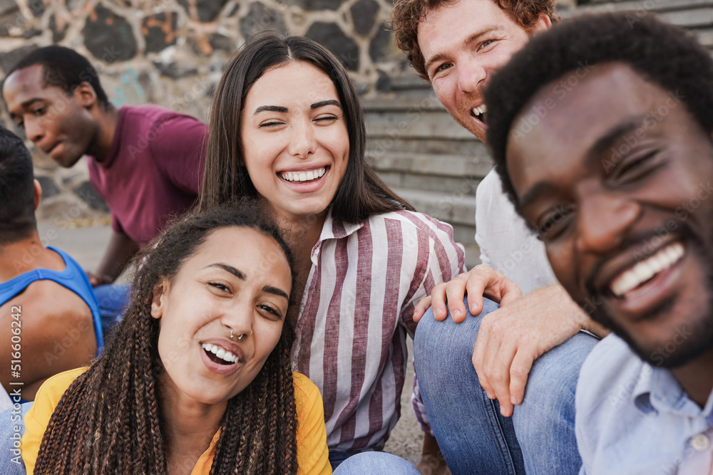 Group of multiracial friends taking a selfie outdoor Group of multiracial friends taking a selfie outdoor