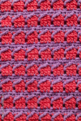 Pink purple seamless knitted texture. Volumetric crochet pattern. Knitted background. © Tanya
